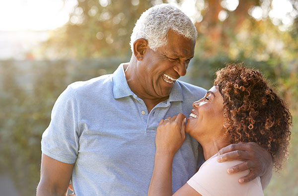 59_Brochure_0001_portrait-of-smiling-senior-african-american-couple-53JSG9Y